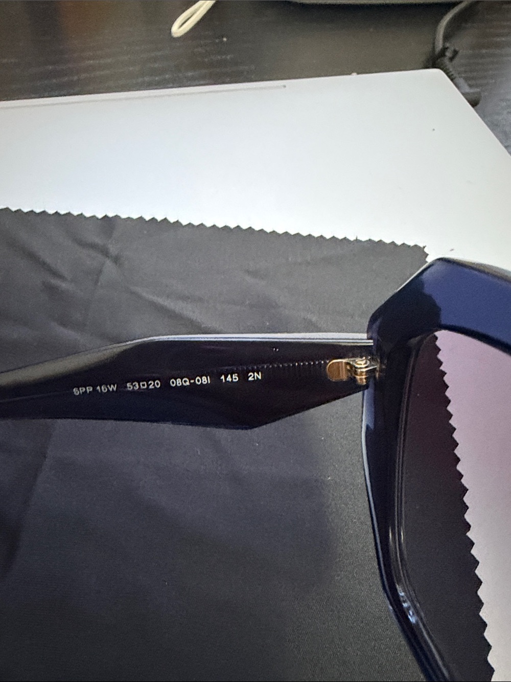 Prada Dark Blue Sunglasses with Gold Logo Accent - Picture 6 of 12